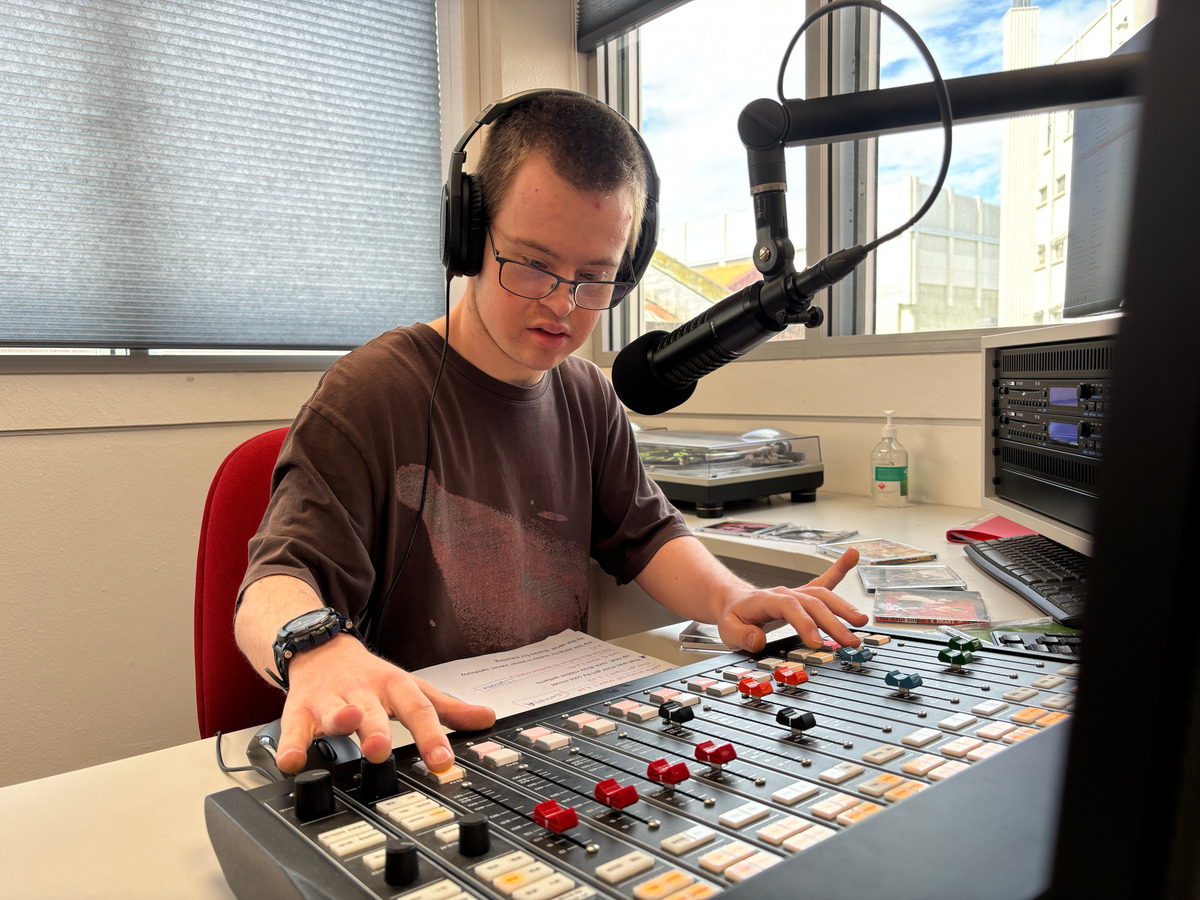 Connor from 'Connor's Hits' at the broadcasting console