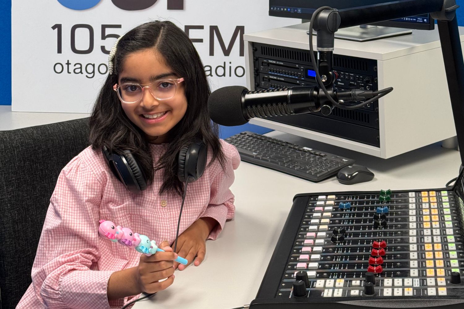 Parishay in studio with her pen
