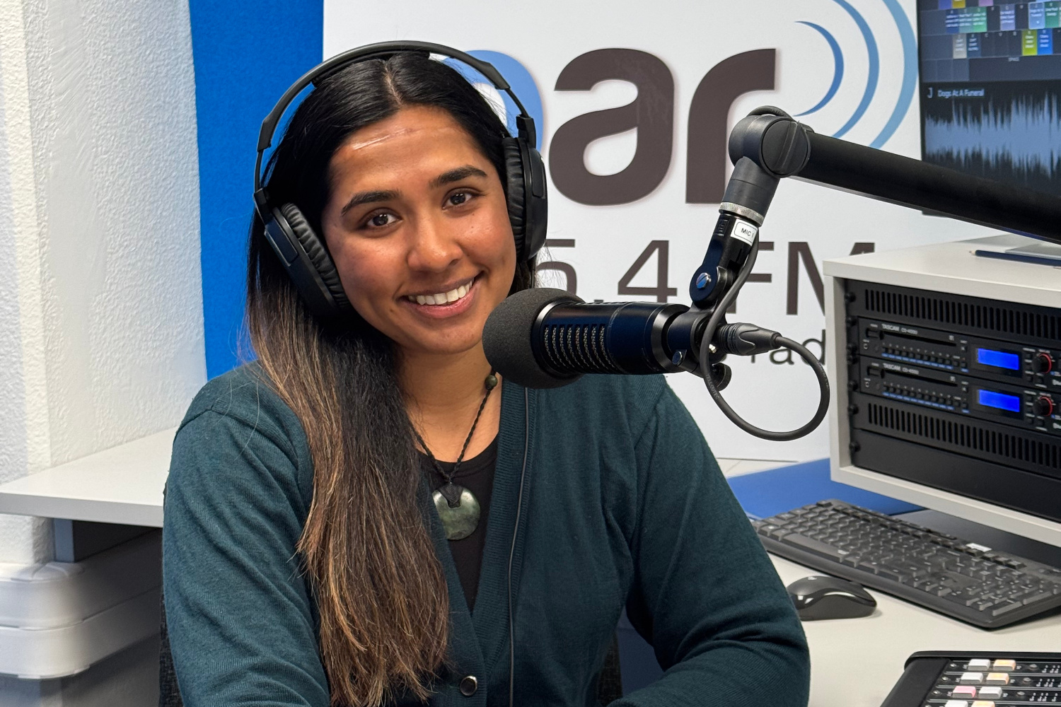 Namrata Chand in OAR FM Studio in front of a microphone